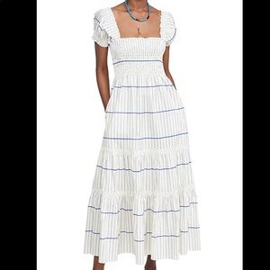 Tory Burch midi smocked dress in size medium.